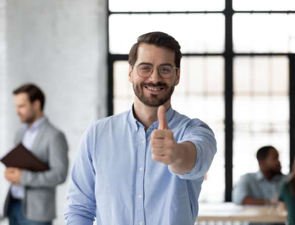 Merchant giving a thumbs up